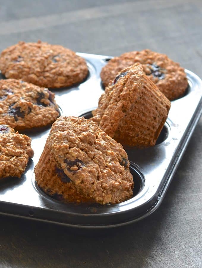 Simple & delicious Vegan Blueberry Bran Muffins that are packed full of healthy ingredients. Only 140 calories each, whole grain, oil & refined-sugar free. Perfect for breakfast, snacks & lunch boxes!