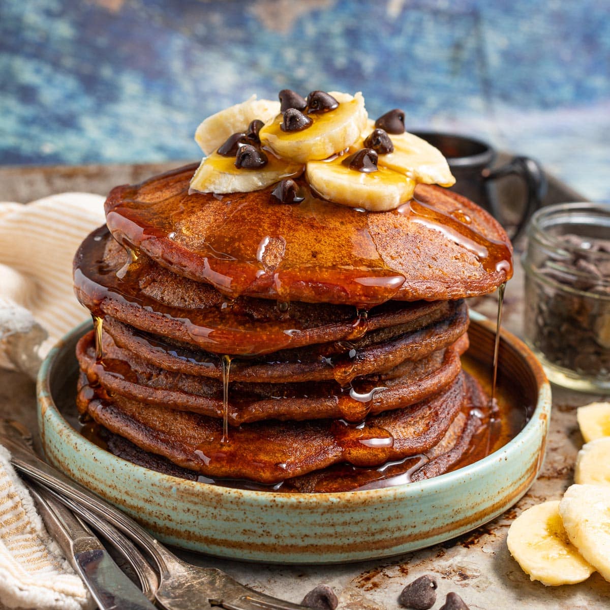 a stack of chocolate banana pancakes