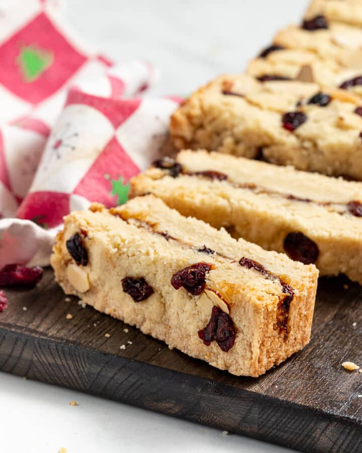 sliced Christmas shortbread on a cutting board