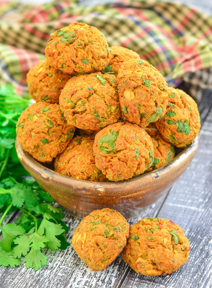 Curried Carrot Baked Falafel in bowl with cilantro