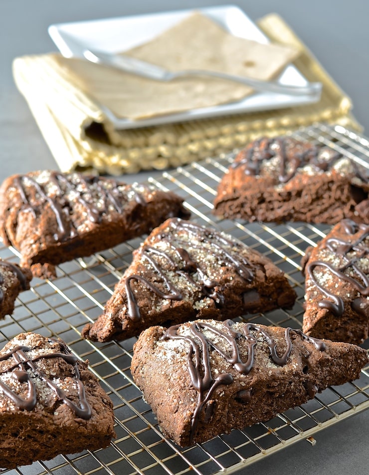 These double chocolate scones might be healthier than traditional versions but I promise there is no sacrifice in taste. Rich, dark, chocolatey & delicious with a tender cocoa enhanced crumb studded with chocolate chunks, they will satisfy the worst chocolate cravings!