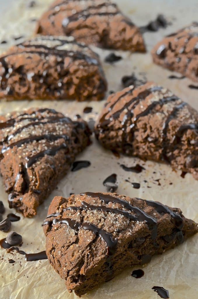 These double chocolate scones might be healthier than traditional versions but I promise there is no sacrifice in taste. Rich, dark, chocolatey & delicious with a tender cocoa enhanced crumb studded with chocolate chunks, they will satisfy the worst chocolate cravings!