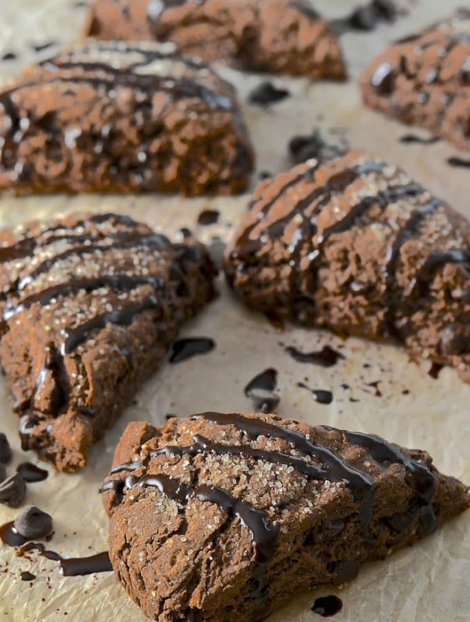 These double chocolate scones might be healthier than traditional versions but I promise there is no sacrifice in taste. Rich, dark, chocolatey & delicious with a tender cocoa enhanced crumb studded with chocolate chunks, they will satisfy the worst chocolate cravings!