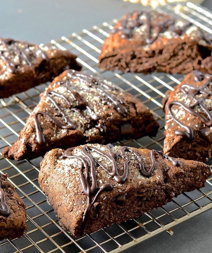 These double chocolate scones might be healthier than traditional versions but I promise there is no sacrifice in taste. Rich, dark, chocolatey & delicious with a tender cocoa enhanced crumb studded with chocolate chunks, they will satisfy the worst chocolate cravings!