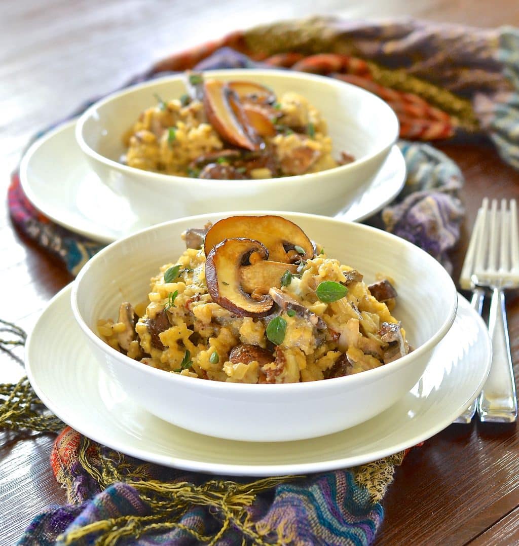 Ultra creamy, ultra dreamy, garlicky mushroom risotto. So unbelievably rich & delicious that it's hard to believe there is no butter or parmesan in it like traditional risotto.