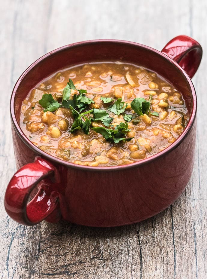 Super cozy, easy to prepare, Indian Lentil Soup with Kale & Cilantro. Packed with nutrition & perfectly spiced for maximum flavour! 