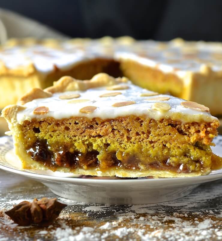 Crisp pastry, rich mincemeat, delicate spice infused sponge & brilliant white, sweet frosting come together to create a taste & texture explosion. This Festive Mincemeat Tart is indulgent, rich & just perfect for the holidays!