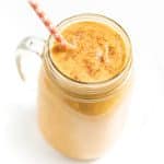 sweet potato smoothie with an orange flowery straw