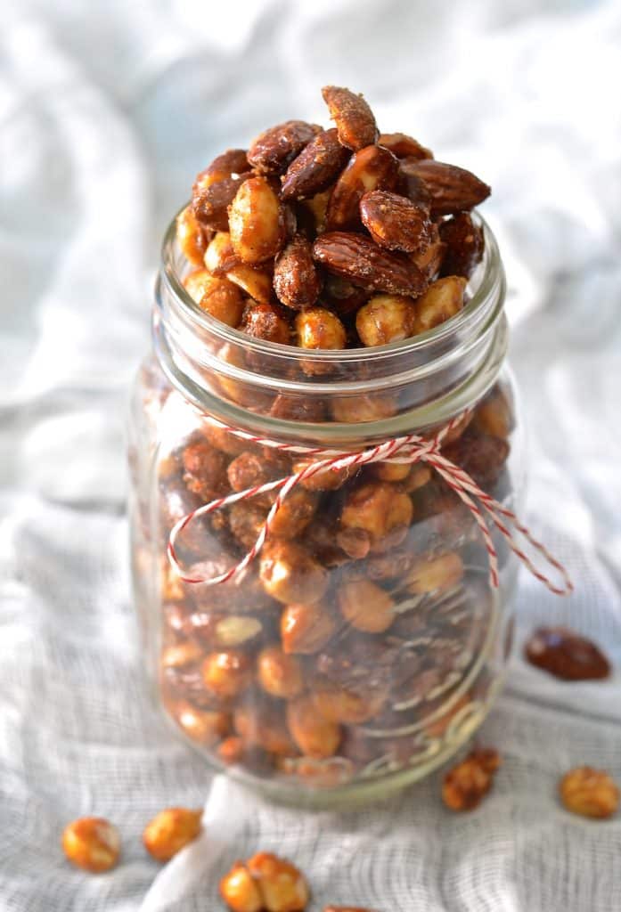 Perfectly sweet & spicy, chewy & crunchy vegan candied nuts. Make a double batch because everybody will go nuts for these!