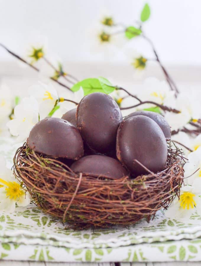 Vegan Caramel Eggs nestled in a faux bird's nest