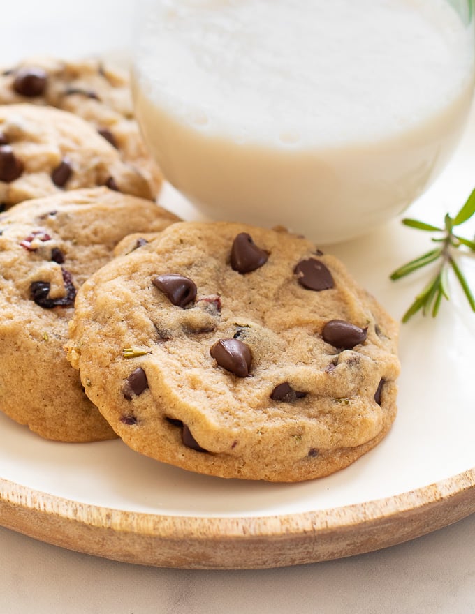 Vegan Chocolate Chip Cookies on a plate with some almond milk