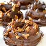 Chocolate Pumpkin Donuts with a sprinkle of nuts