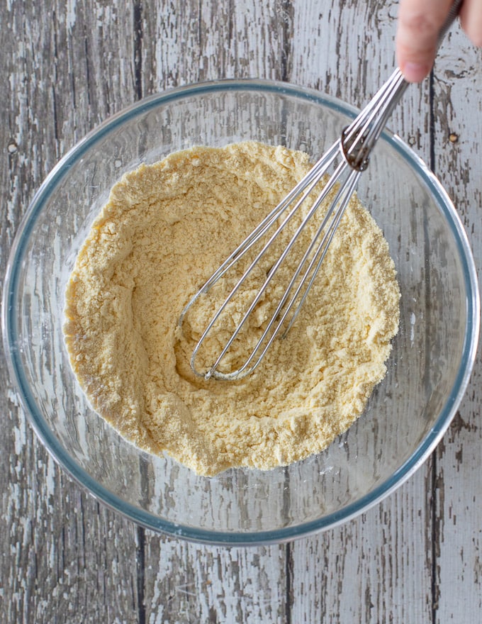 Dry ingredients for Vegan Gluten Free Pancakes whisked together in a bowl