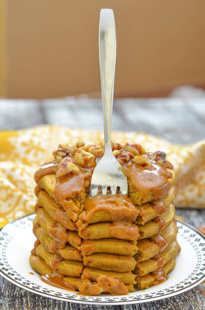 Vegan Mother's Day recipes - Behold these fluffy, golden pancakes in all of their whole-grain, vegetable containing, coconut sugar, spiced glory.......Yes my friends, these are Vegan Sweet Potato Pancakes drizzled in THE most delicious Caramel Sauce.